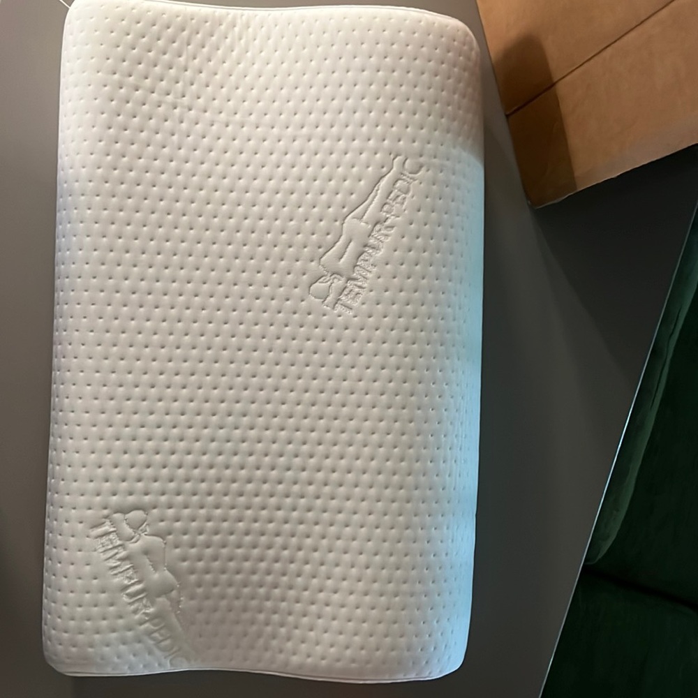 Brand New Never Used Tempur-Pedic neck support pillow.